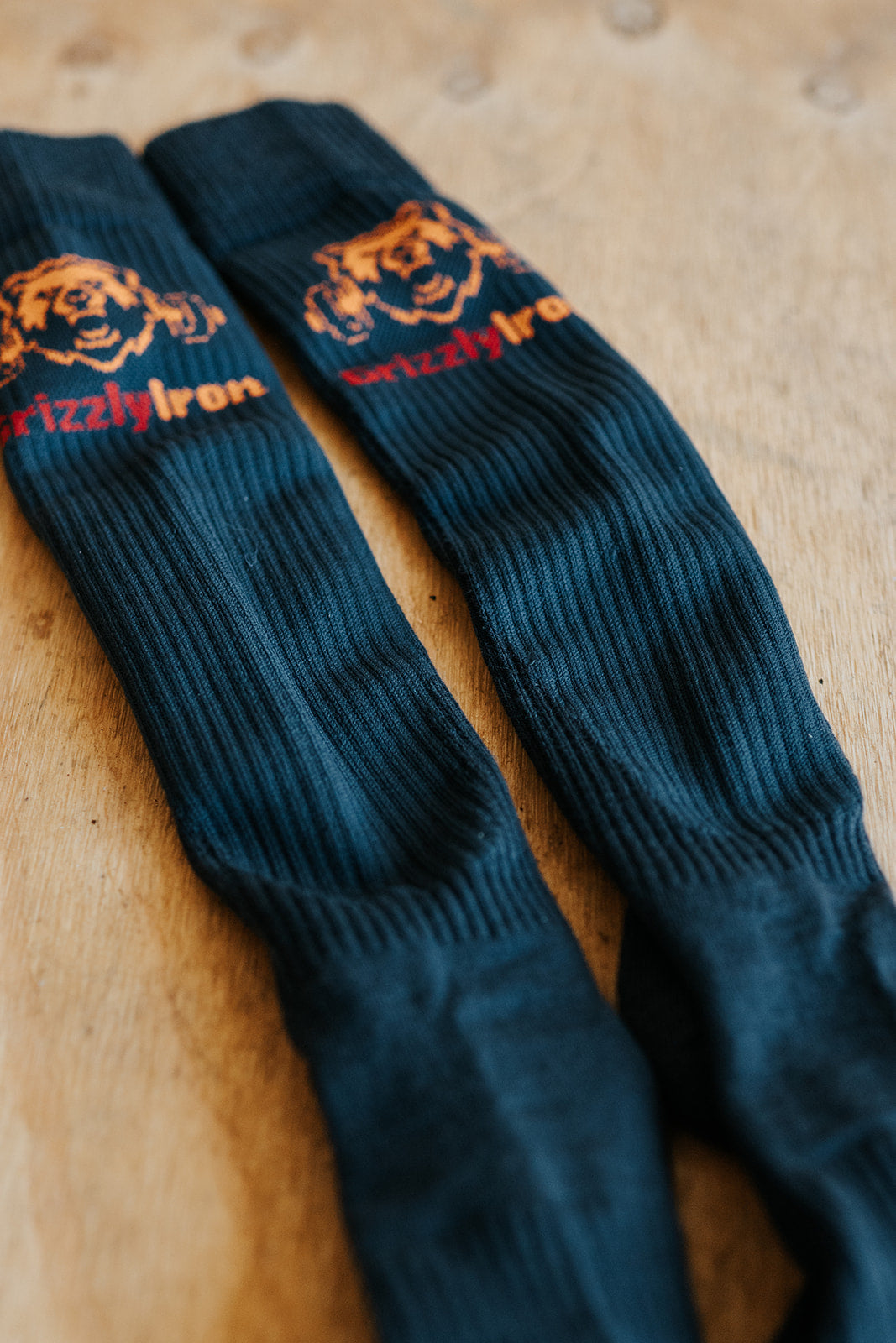 GrizzlyIron First Pull knee-high weightlifting socks with SlideShield shin guard weave, Easy On and Stay Up compression
