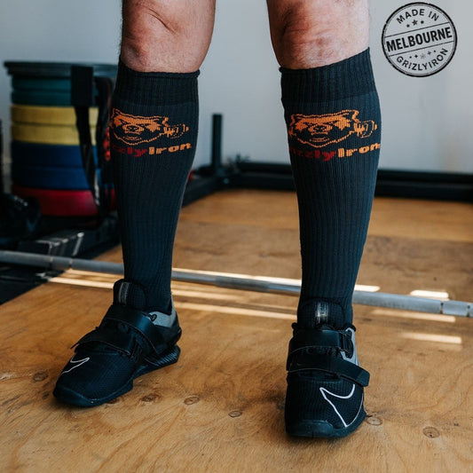 GrizzlyIron First Pull knee-high weightlifting socks with SlideShield shin guard weave, Easy On and Stay Up compression