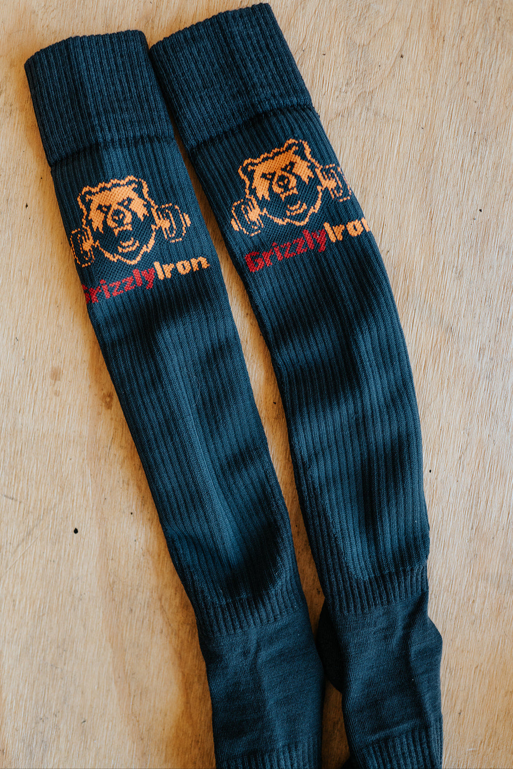 GrizzlyIron First Pull knee-high weightlifting socks with SlideShield shin guard weave, Easy On and Stay Up compression
